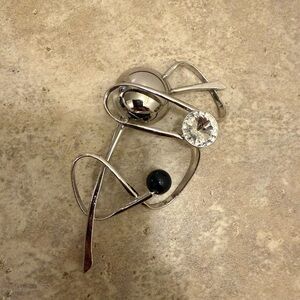 Modern Silver Brooch with Black and Clear Accents